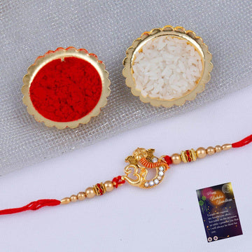 Designer Round Ganesh & OM Rakhi For Bhaiya/Brother/Bhai With Roli Chawal And 1 Greeting Card